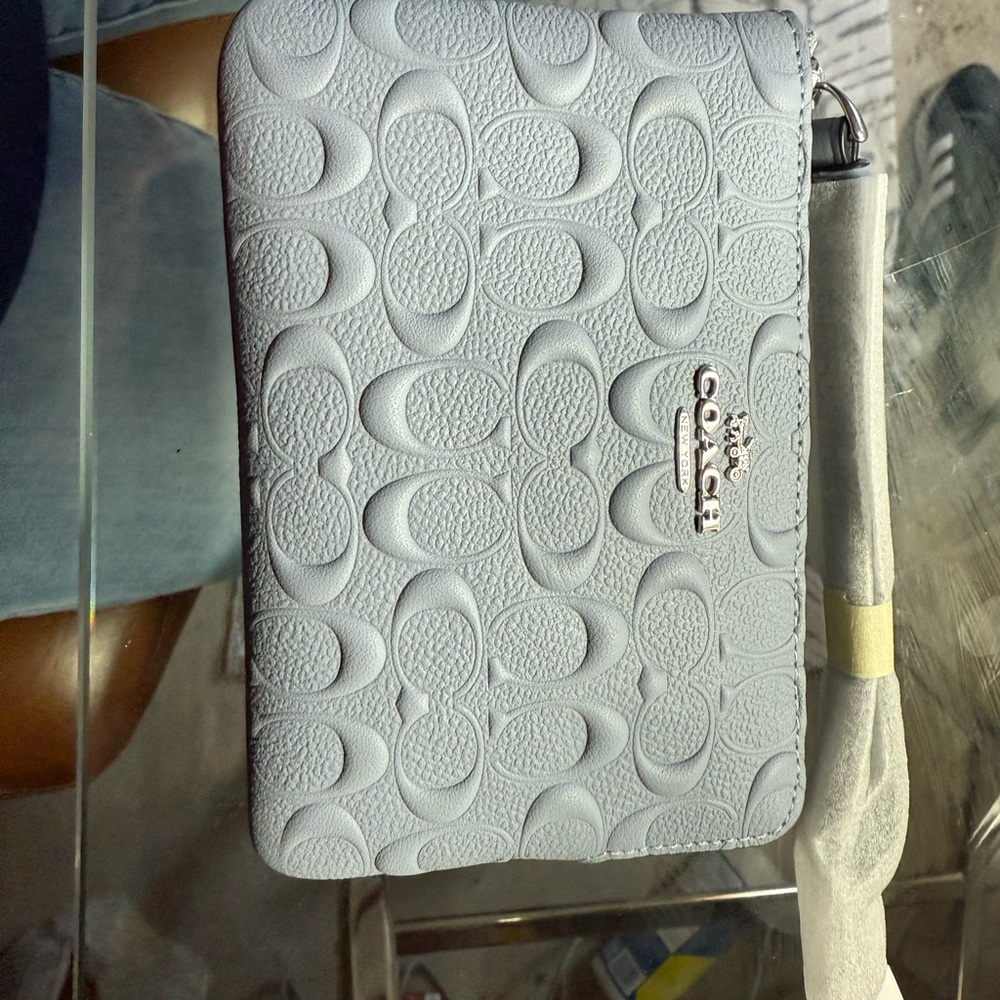 Coach Silver Embossed Clutch
